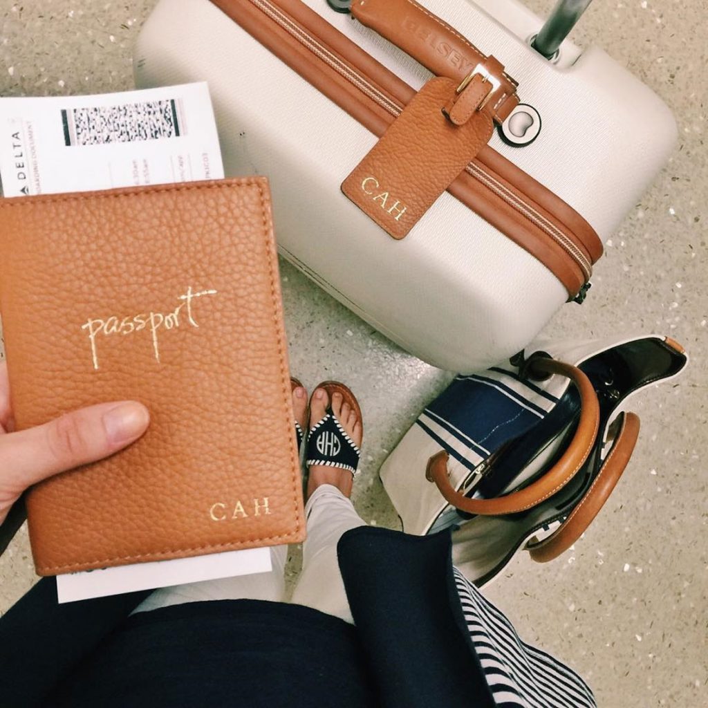 A passport holder - 7 must-have accessories to rock the airport look