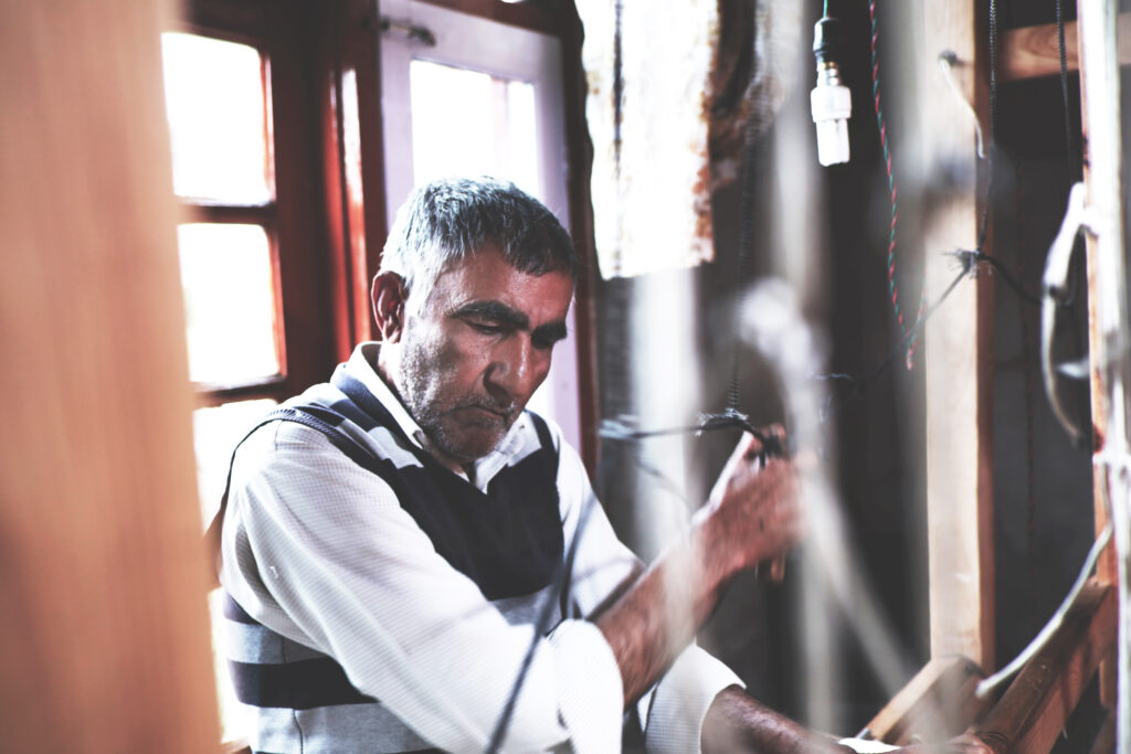 Artisan on Hand Loom