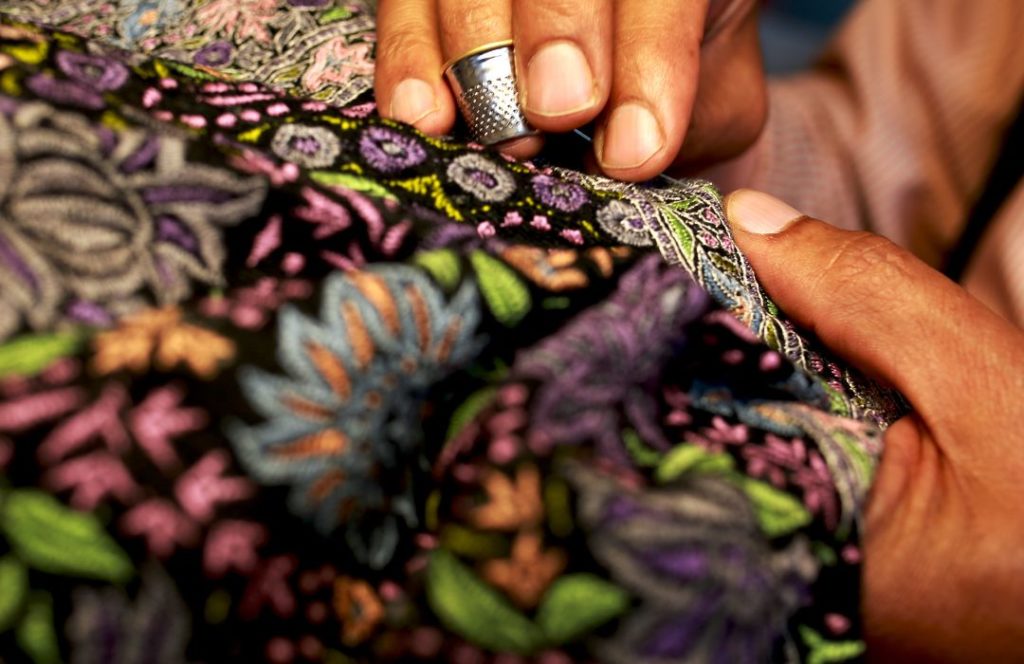 Artisan Hand Embroidering Pashmina